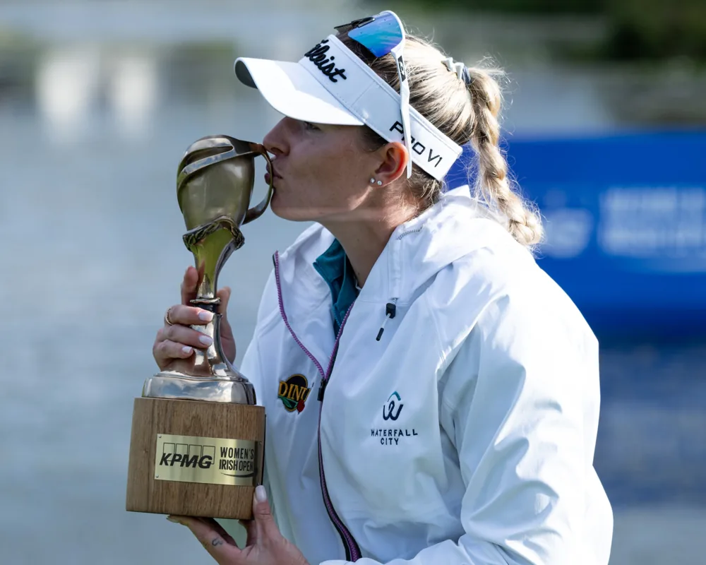 Golf winner kissing KPMG Women’s Irish Open trophy