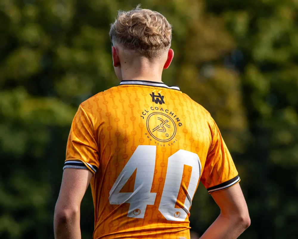 Number 40 in an amber shirt. H&W Welders Reserves v Warrenpoint Reserves.