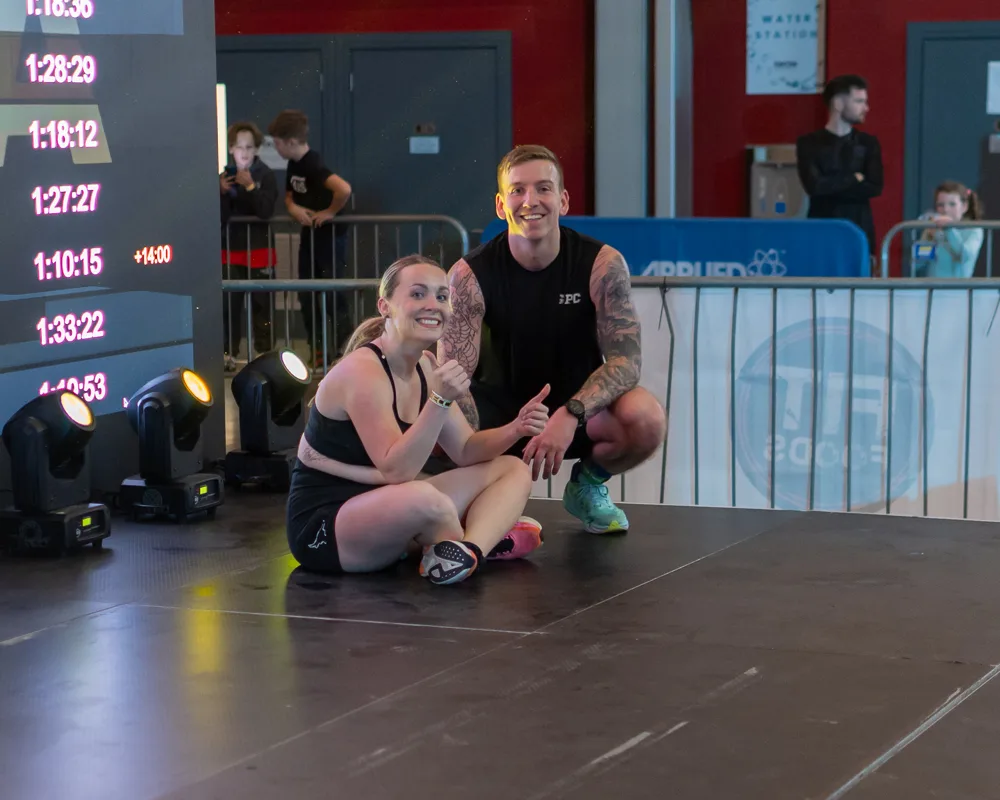 Competitors sit together after their effort. Mecca Sim 5.