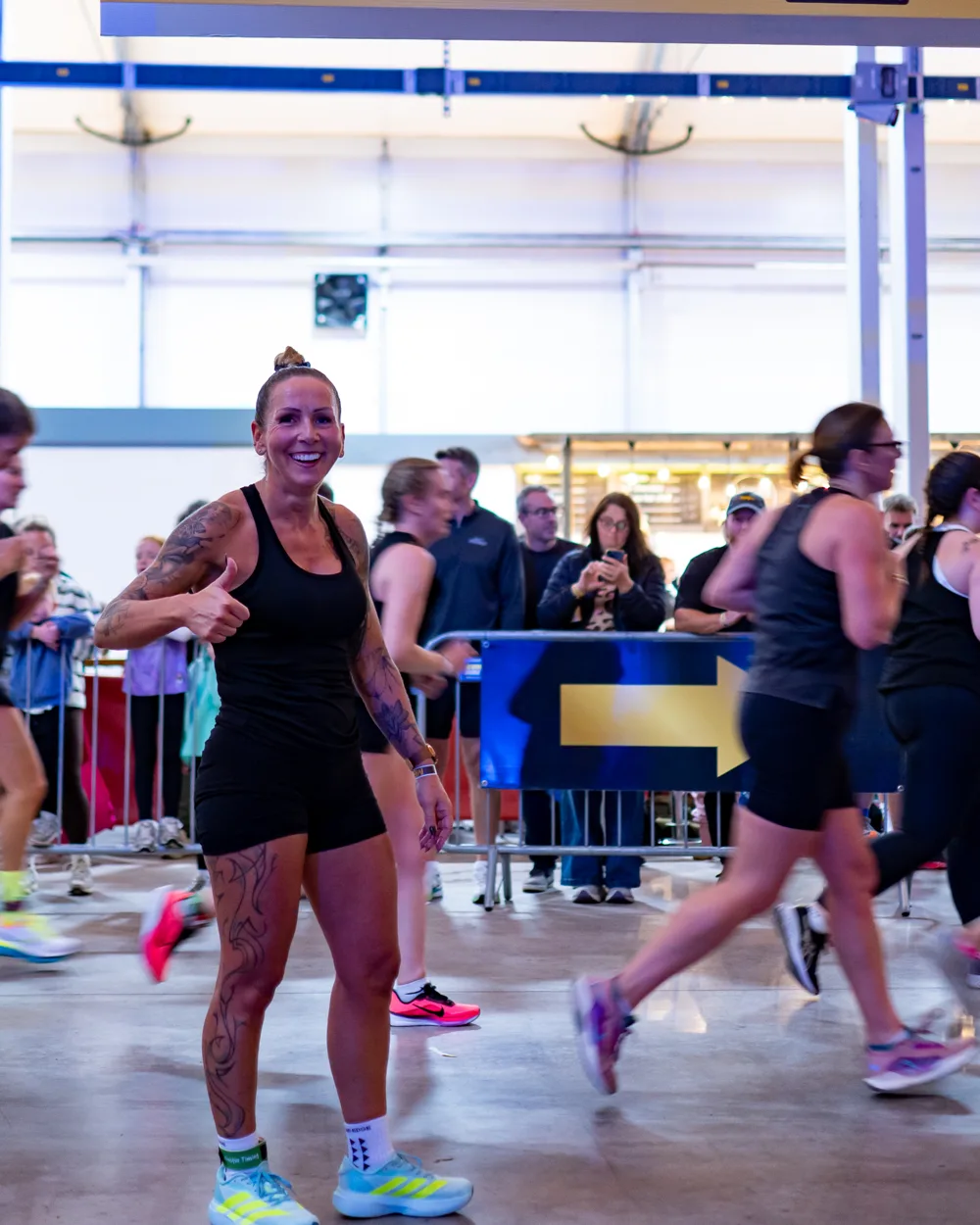 Athletes run through the venue. Mecca Sim 5.