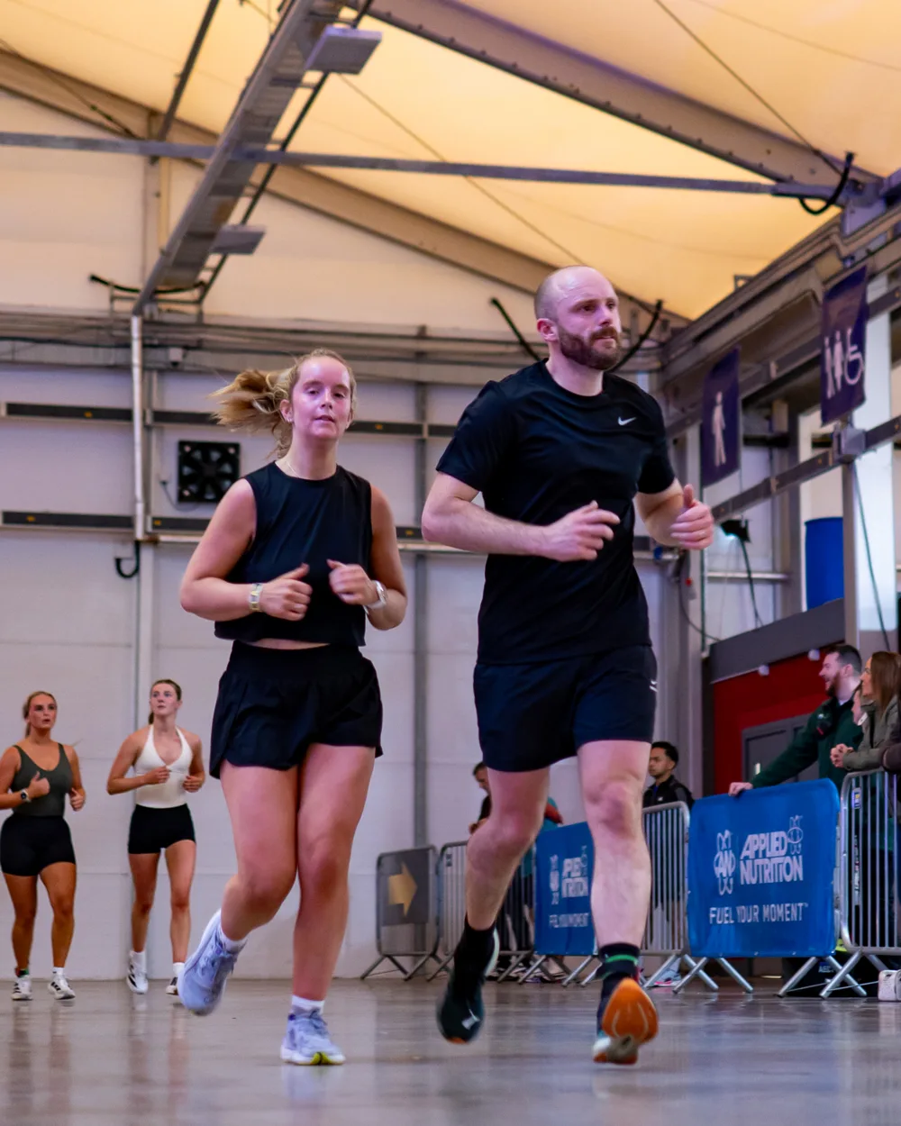 Athletes move through the exercise area. Mecca Sim 5.