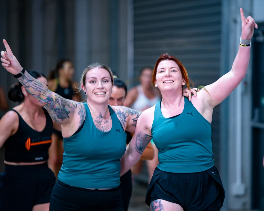 Competitors celebrate together. Mecca Sim 5.