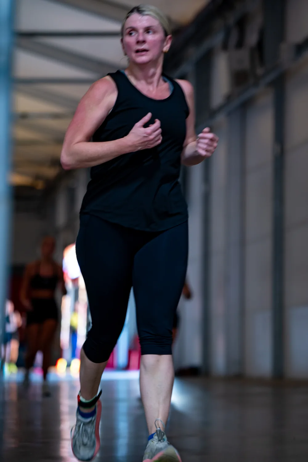 Athlete runs through the venue. Mecca Sim 5.