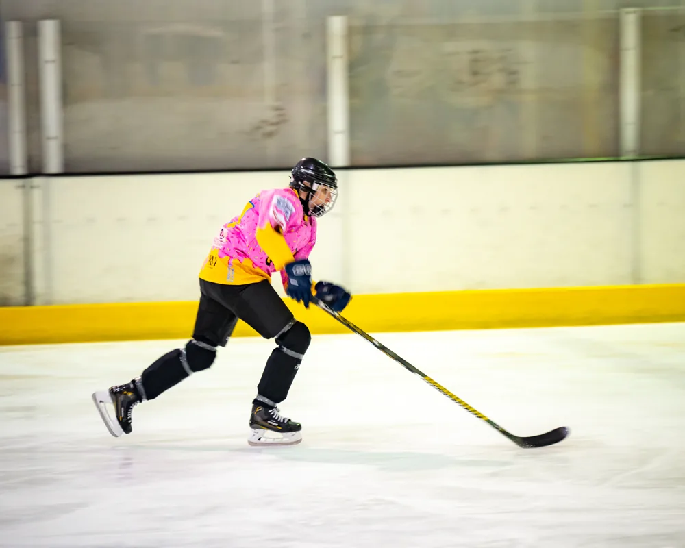 Donuts player skating across the rink