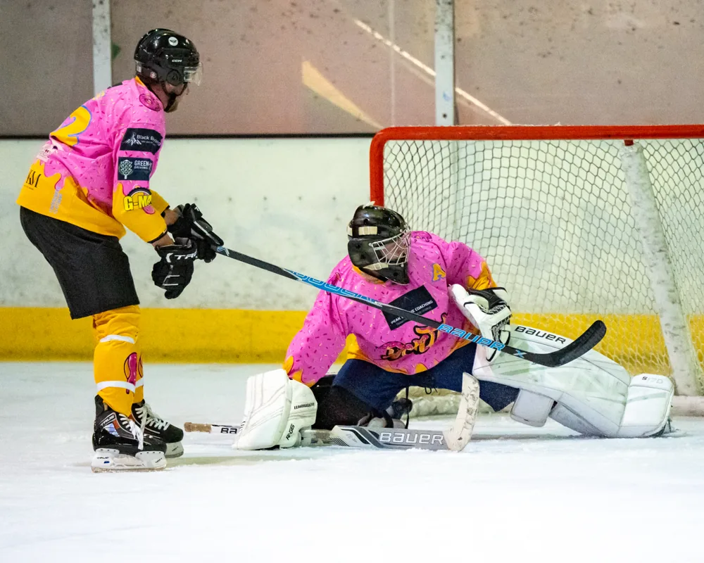 Donuts goaltender defends the crease