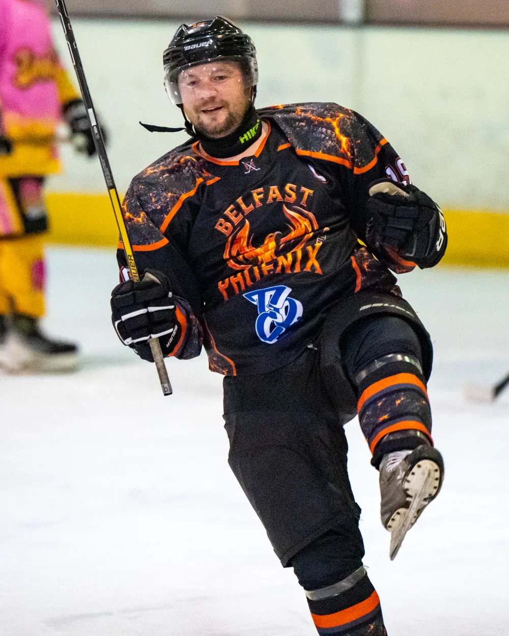 Phoenix number 19 smiling with one skate lifted