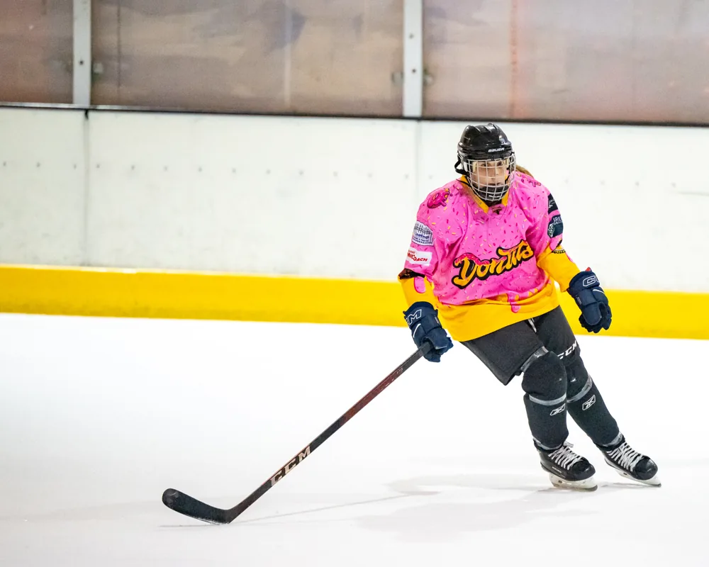 Donuts skater carrying the puck