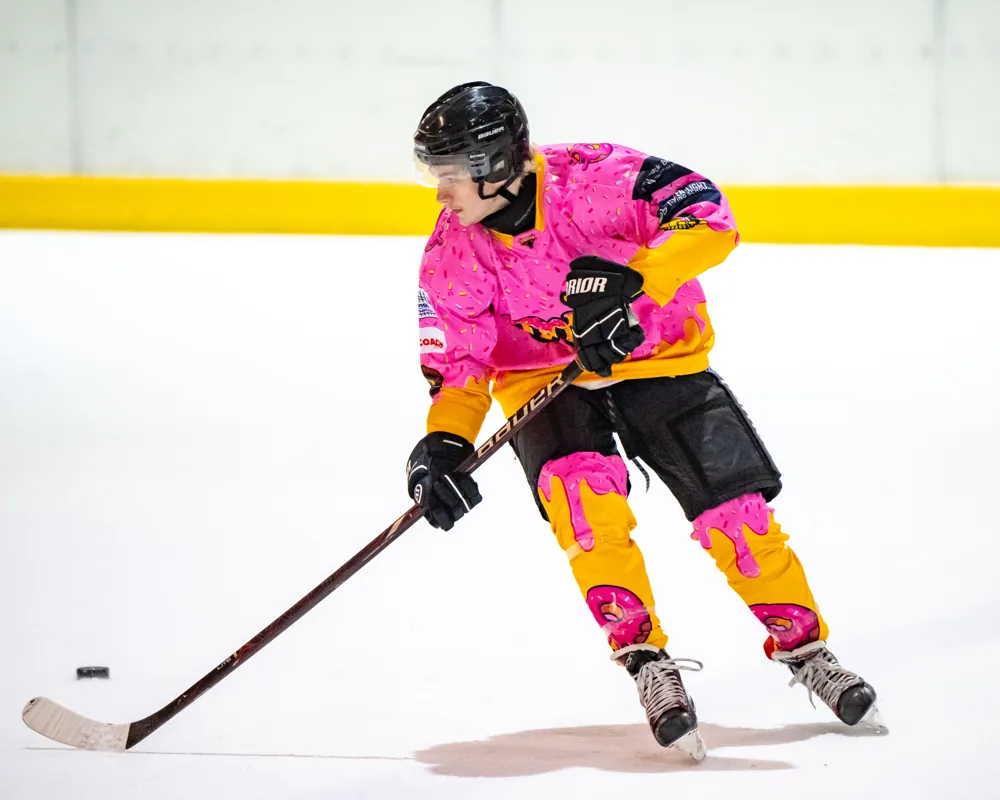Donuts player skating across the ice