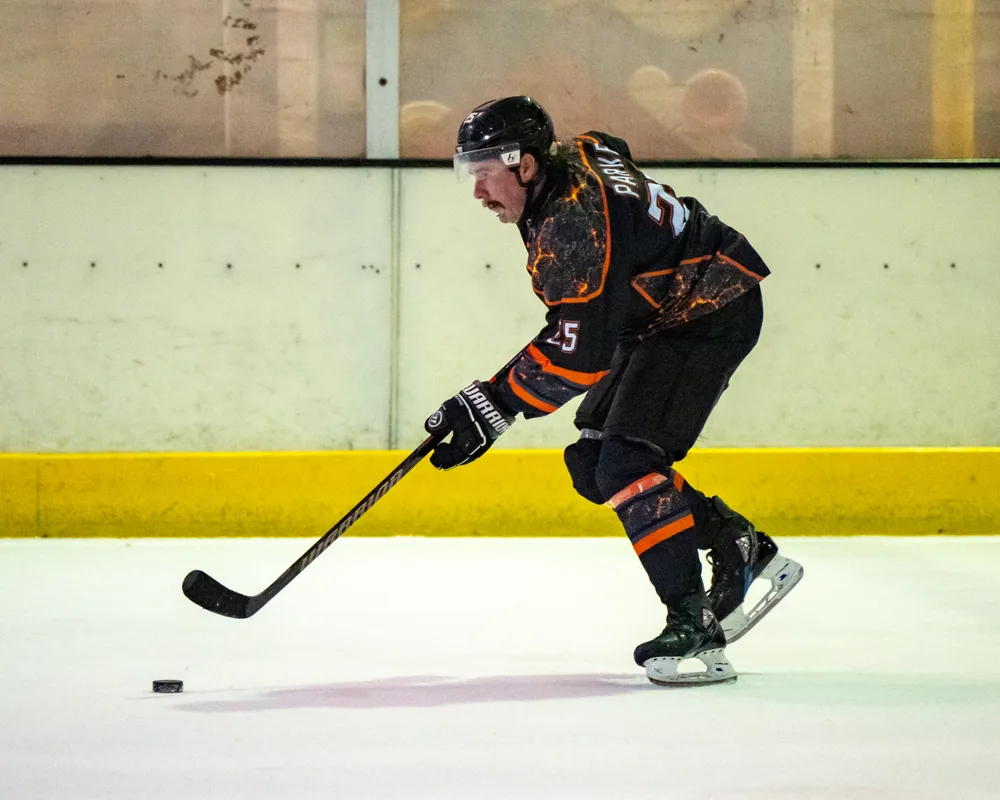 Phoenix player takes a shot, seen side-on