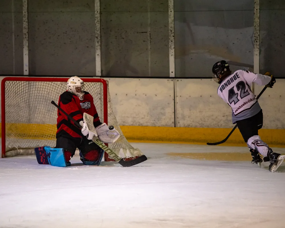 Action beside the goal. Belfast Phoenix v Wild Hawks.